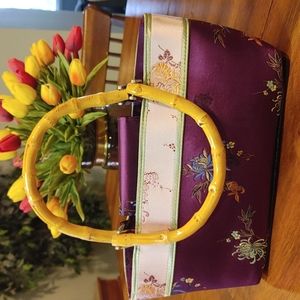 Silk handbag with embroidery detail